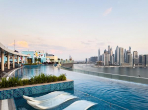 Beachfront Apartment on the Palm Jumeirah with Amazing view Rooftop Infinity Pool